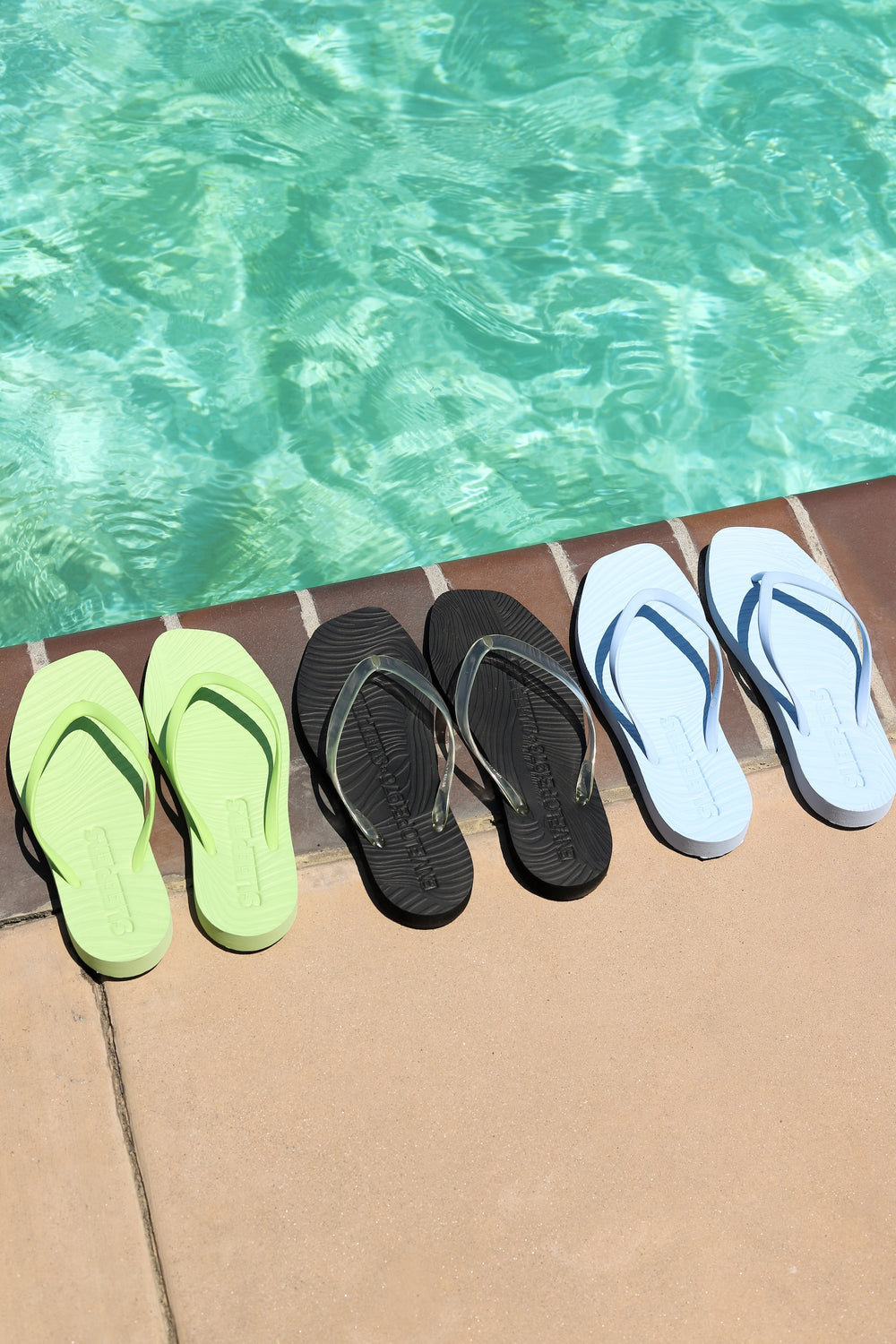 Black + Transparent Tapered Flip Flops